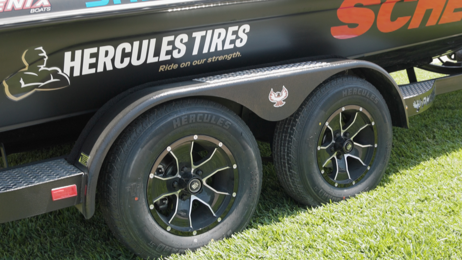 The Hercules Strong Guard ST is outside on a Hercules-branded boat trailer.